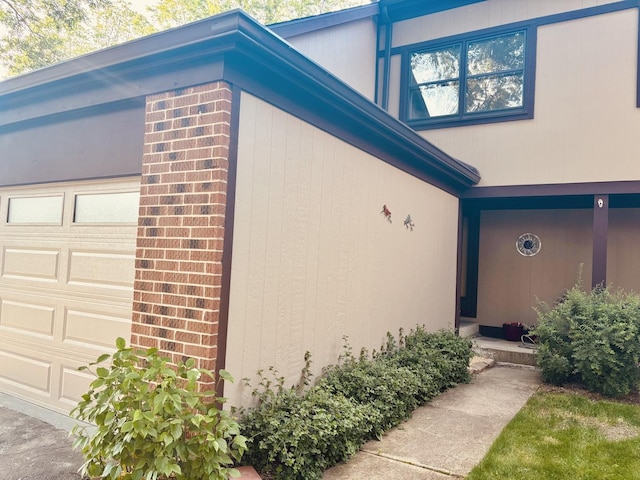 325 Shadowbend Dr, Wheeling, IL 60090 - entrance to property featuring brick siding and a garage