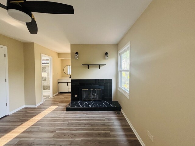 325 Shadowbend Dr, Wheeling, IL 60090 - living room with wood finished floors, ceiling fan, and a tile fireplace