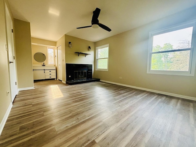 325 Shadowbend Dr, Wheeling, IL 60090 - unfurnished living room featuring a ceiling fan, wood finished floors, and a fireplace