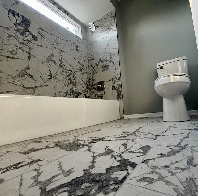 325 Shadowbend Dr, Wheeling, IL 60090 - full bathroom featuring marble finish flooring, tub / shower combination, and stone wall