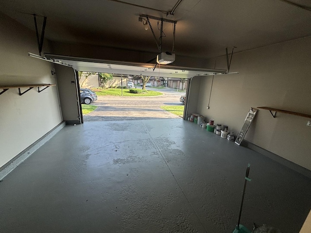 325 Shadowbend Dr, Wheeling, IL 60090 - garage with a garage door opener and baseboards