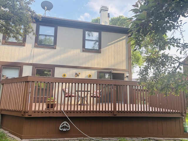 325 Shadowbend Dr, Wheeling, IL 60090 - rear view of property featuring a wooden deck and a chimney