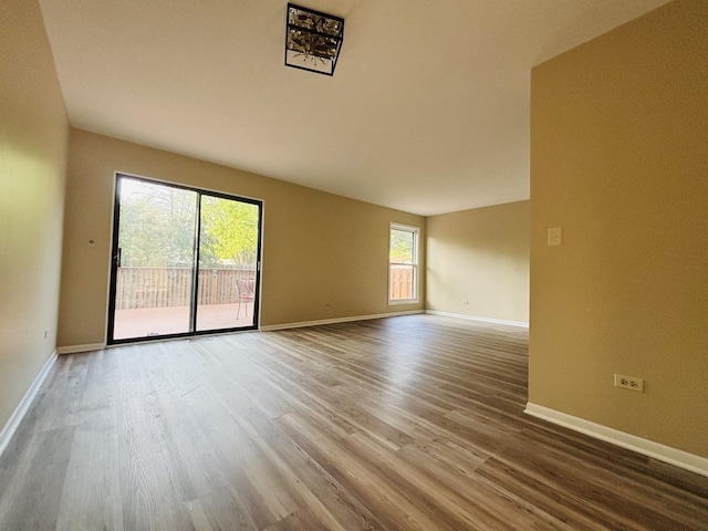 325 Shadowbend Dr, Wheeling, IL 60090 - spare room featuring baseboards and wood finished floors