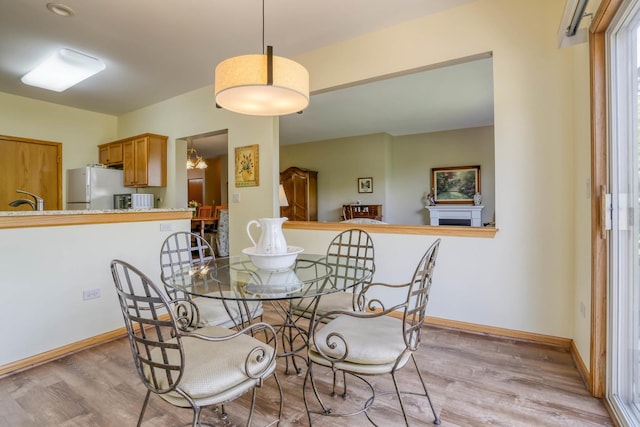 13504 S Buckthorn Ln, Plainfield, IL 60544 - dining area featuring light wood-style flooring