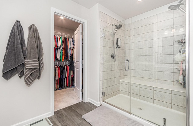 3068 Grande Trl, Yorkville, IL 60560 - full bath featuring wood finished floors, a shower stall, and a walk in closet