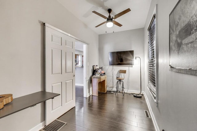 2150 W Coulter St, Chicago, IL 60608 - living area with a ceiling fan and dark wood-style flooring