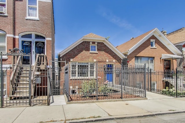 2150 W Coulter St, Chicago, IL 60608 - view of front of home with brick siding and a fenced front yard