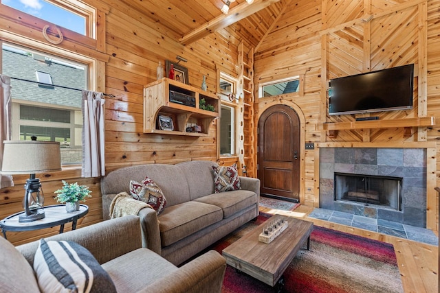 7N230 Sims Ln, Saint Charles, IL 60175 - living area with wood walls, high vaulted ceiling, a tile fireplace, and wood ceiling