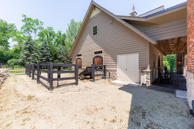 7N230 Sims Ln, Saint Charles, IL 60175 - view of property exterior featuring stone siding