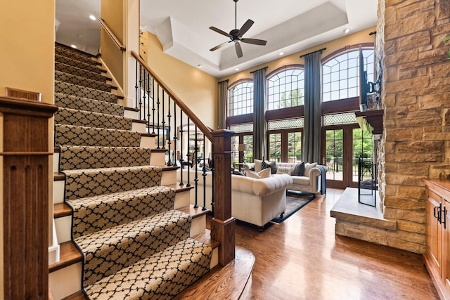 7N230 Sims Ln, Saint Charles, IL 60175 - living area with wood finished floors, a ceiling fan, stairway, a towering ceiling, and recessed lighting