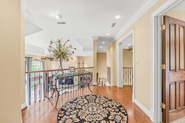 7N230 Sims Ln, Saint Charles, IL 60175 - hallway with an upstairs landing, wood finished floors, ornamental molding, and recessed lighting
