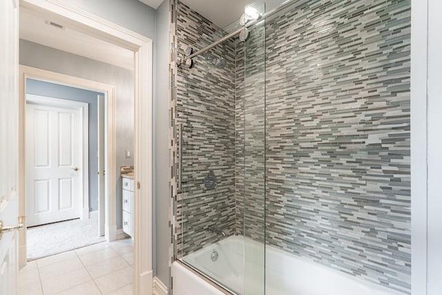 7N230 Sims Ln, Saint Charles, IL 60175 - bathroom with bath / shower combo with glass door, tile patterned flooring, and vanity