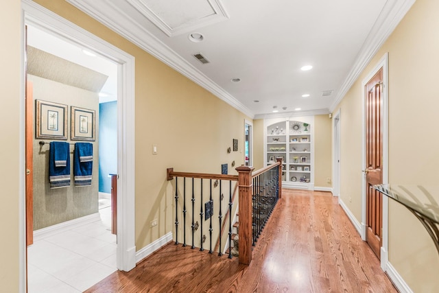 7N230 Sims Ln, Saint Charles, IL 60175 - corridor featuring an upstairs landing, crown molding, built in features, light wood-style floors, and recessed lighting