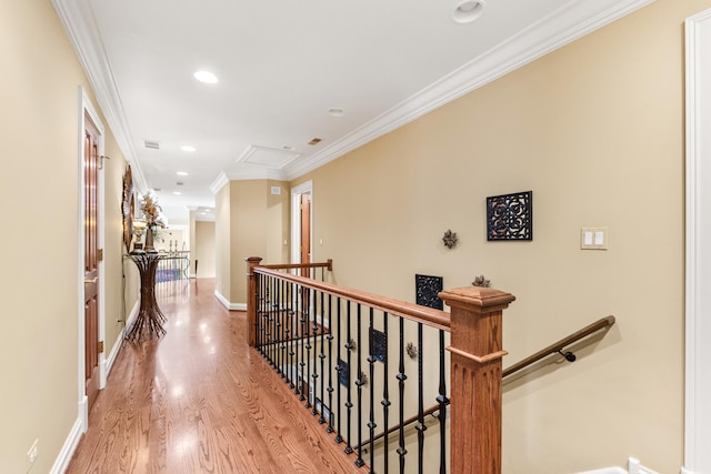 7N230 Sims Ln, Saint Charles, IL 60175 - hall featuring an upstairs landing, recessed lighting, wood finished floors, and ornamental molding