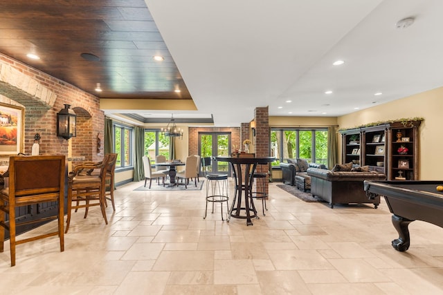 7N230 Sims Ln, Saint Charles, IL 60175 - recreation room with healthy amount of natural light, stone tile floors, recessed lighting, pool table, and a tray ceiling