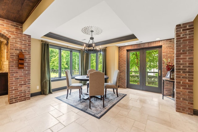 7N230 Sims Ln, Saint Charles, IL 60175 - dining room with a tray ceiling, a chandelier, stone tile flooring, and recessed lighting