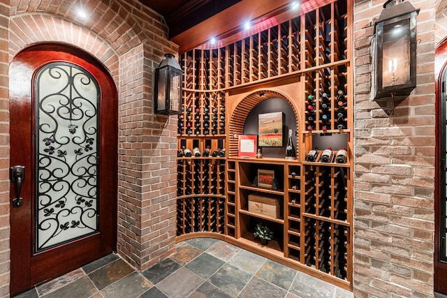 7N230 Sims Ln, Saint Charles, IL 60175 - wine area featuring stone tile flooring and brick wall