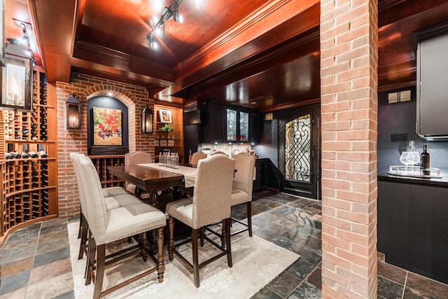 7N230 Sims Ln, Saint Charles, IL 60175 - dining area featuring stone tile floors, ornamental molding, and wood ceiling
