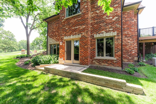7N230 Sims Ln, Saint Charles, IL 60175 - back of house with a lawn and brick siding