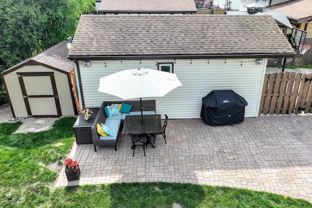 220 E Park Ave, Bloomingdale, IL 60108 - view of patio featuring area for grilling and a storage shed