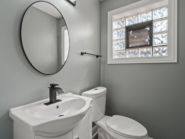 15035 Evers St, Dolton, IL 60419 - half bathroom featuring vanity and toilet