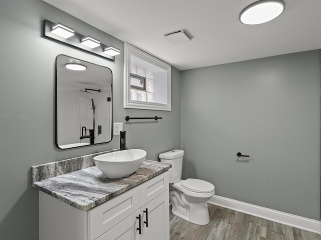 15035 Evers St, Dolton, IL 60419 - full bathroom with vanity, wood finished floors, and a shower