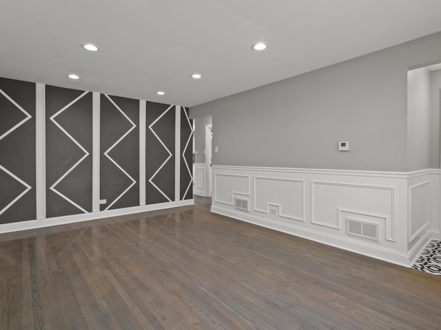 15035 Evers St, Dolton, IL 60419 - unfurnished room featuring wood finished floors, recessed lighting, wainscoting, and a decorative wall