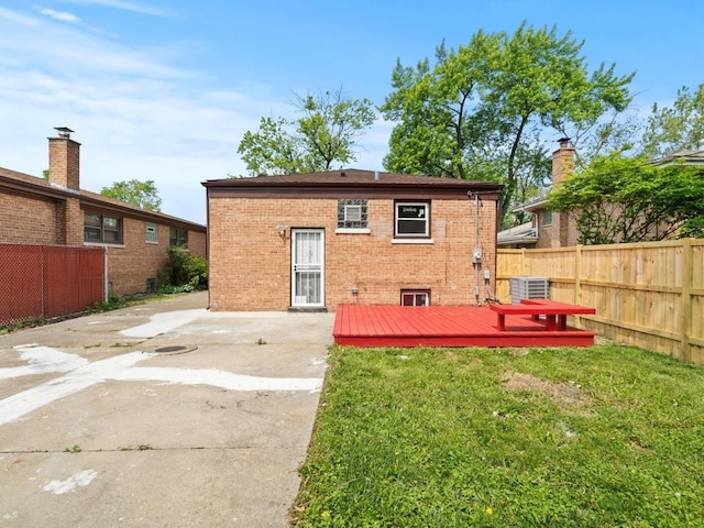 15035 Evers St, Dolton, IL 60419 - back of house with brick siding, a wooden deck, and a patio area