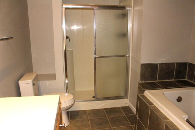 16666 Carle Springs Rd, Wapella, IL 61777 - full bath with tile patterned floors, a stall shower, a garden tub, and vanity