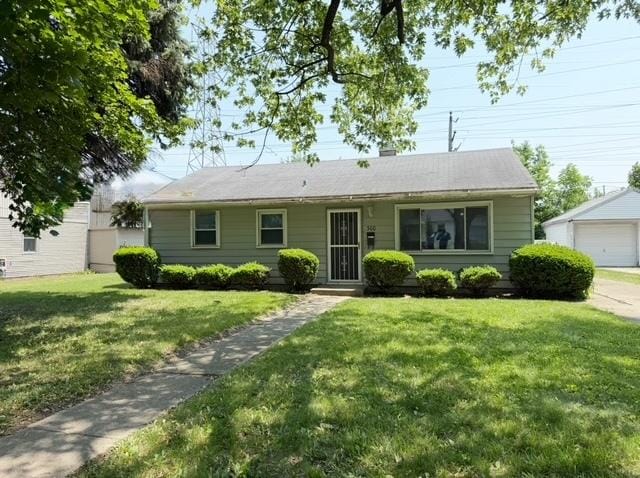 300 Notre Dame Ave, Joliet, IL 60436 - view of front of property featuring a front lawn and an outbuilding