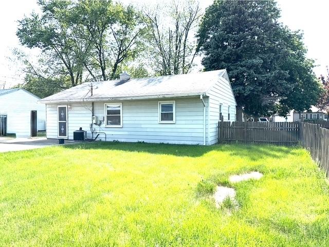 300 Notre Dame Ave, Joliet, IL 60436 - rear view of house featuring a chimney