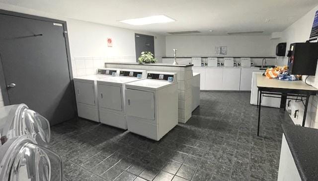 6700 S Brainard Ave Unit 223, Countryside, IL 60525 - shared laundry featuring washing machine and clothes dryer
