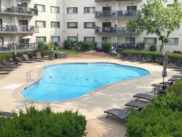 6700 S Brainard Ave Unit 223, Countryside, IL 60525 - community pool with a patio