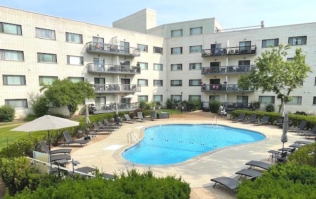 6700 S Brainard Ave Unit 223, Countryside, IL 60525 - community pool with a patio