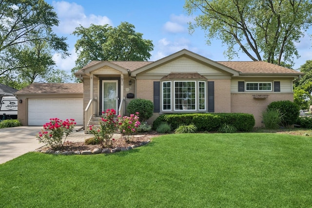 661 E Clarendon Ct, Arlington Heights, IL 60004 - ranch-style home featuring brick siding, an attached garage, concrete driveway, and a front yard