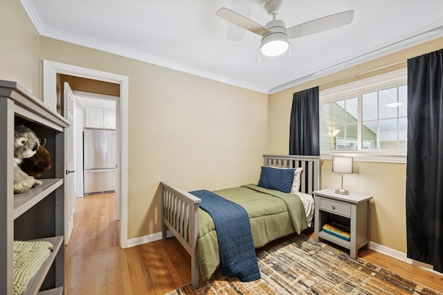 661 E Clarendon Ct, Arlington Heights, IL 60004 - bedroom with stainless steel fridge, light wood-style flooring, ornamental molding, and a ceiling fan