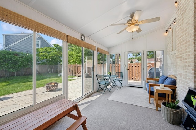 661 E Clarendon Ct, Arlington Heights, IL 60004 - sunroom with a fire pit, lofted ceiling, and a ceiling fan