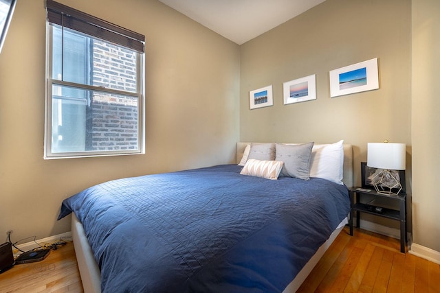 530 N Ashland Ave, Chicago, IL 60622 - bedroom with baseboards and hardwood / wood-style floors