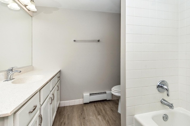 254 E Bailey Rd Unit M, Naperville, IL 60565 - bathroom featuring a baseboard radiator, vanity, wood finished floors, and bathtub / shower combination