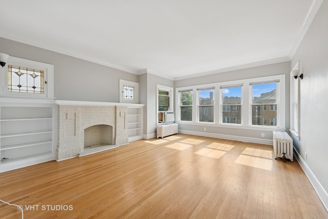 6208 N Artesian Ave, Chicago, IL 60659 - unfurnished living room with radiator heating unit, wood finished floors, ornamental molding, a fireplace, and cooling unit