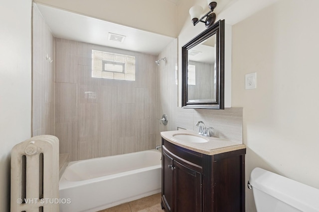 6208 N Artesian Ave, Chicago, IL 60659 - bathroom with radiator heating unit, vanity, bathing tub / shower combination, backsplash, and tile patterned flooring