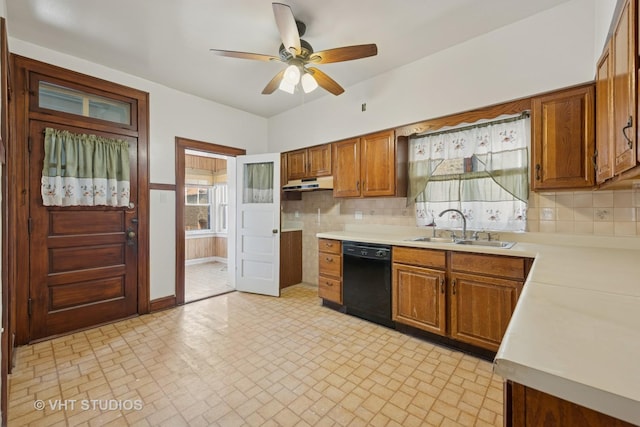 6208 N Artesian Ave, Chicago, IL 60659 - kitchen featuring dishwasher, light countertops, tasteful backsplash, under cabinet range hood, and brown cabinetry