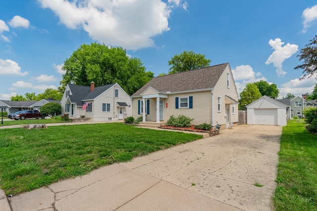 416 S Nelson Ave, Morton, IL 61550 - bungalow-style home featuring an outdoor structure, a detached garage, a residential view, and a front lawn