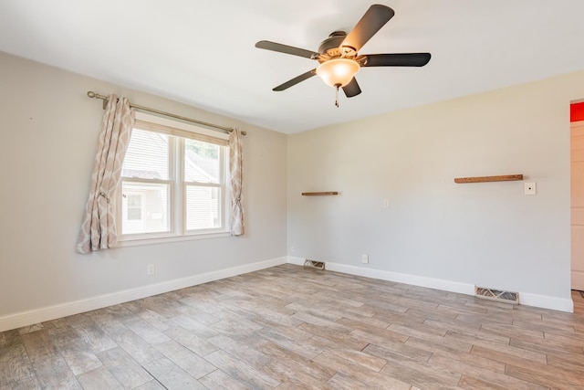 416 S Nelson Ave, Morton, IL 61550 - unfurnished room featuring light wood-style floors and ceiling fan