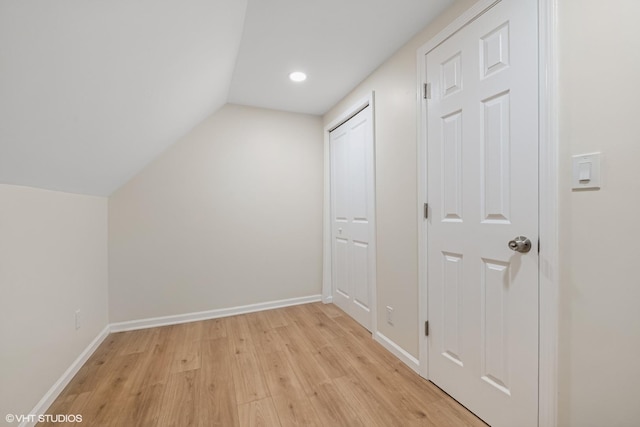 6317 W Cuyler Ave, Chicago, IL 60634 - additional living space featuring light wood-type flooring, lofted ceiling, and recessed lighting