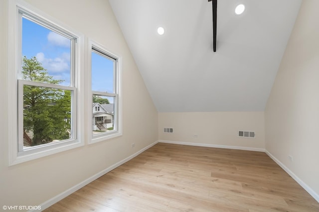 6317 W Cuyler Ave, Chicago, IL 60634 - bonus room with light wood-style floors and lofted ceiling