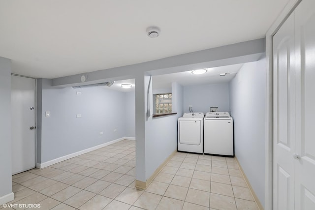 6317 W Cuyler Ave, Chicago, IL 60634 - laundry area with washing machine and clothes dryer and light tile patterned floors