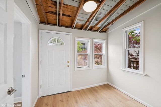6317 W Cuyler Ave, Chicago, IL 60634 - entryway featuring wooden ceiling, plenty of natural light, and light wood finished floors