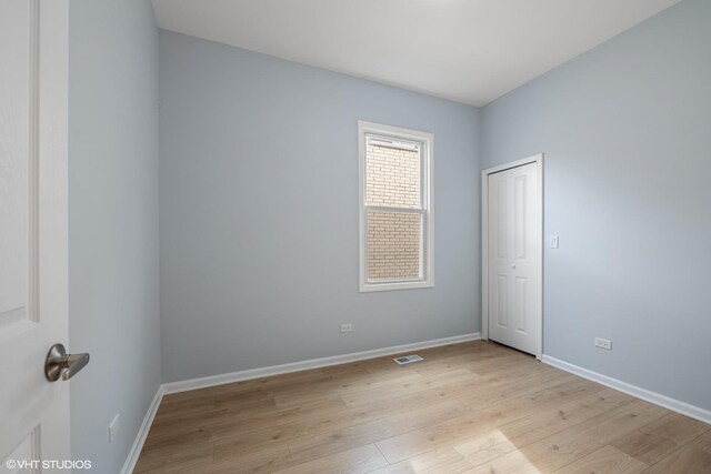 6317 W Cuyler Ave, Chicago, IL 60634 - unfurnished room featuring light wood-type flooring and baseboards
