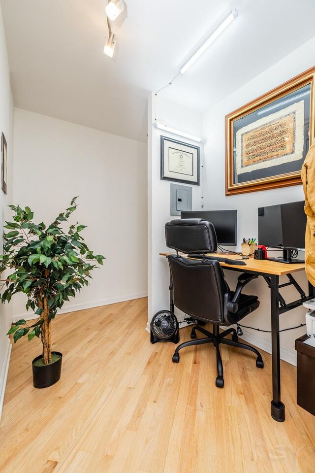 100 E Walton St Unit 38H, Chicago, IL 60611 - home office featuring wood finished floors